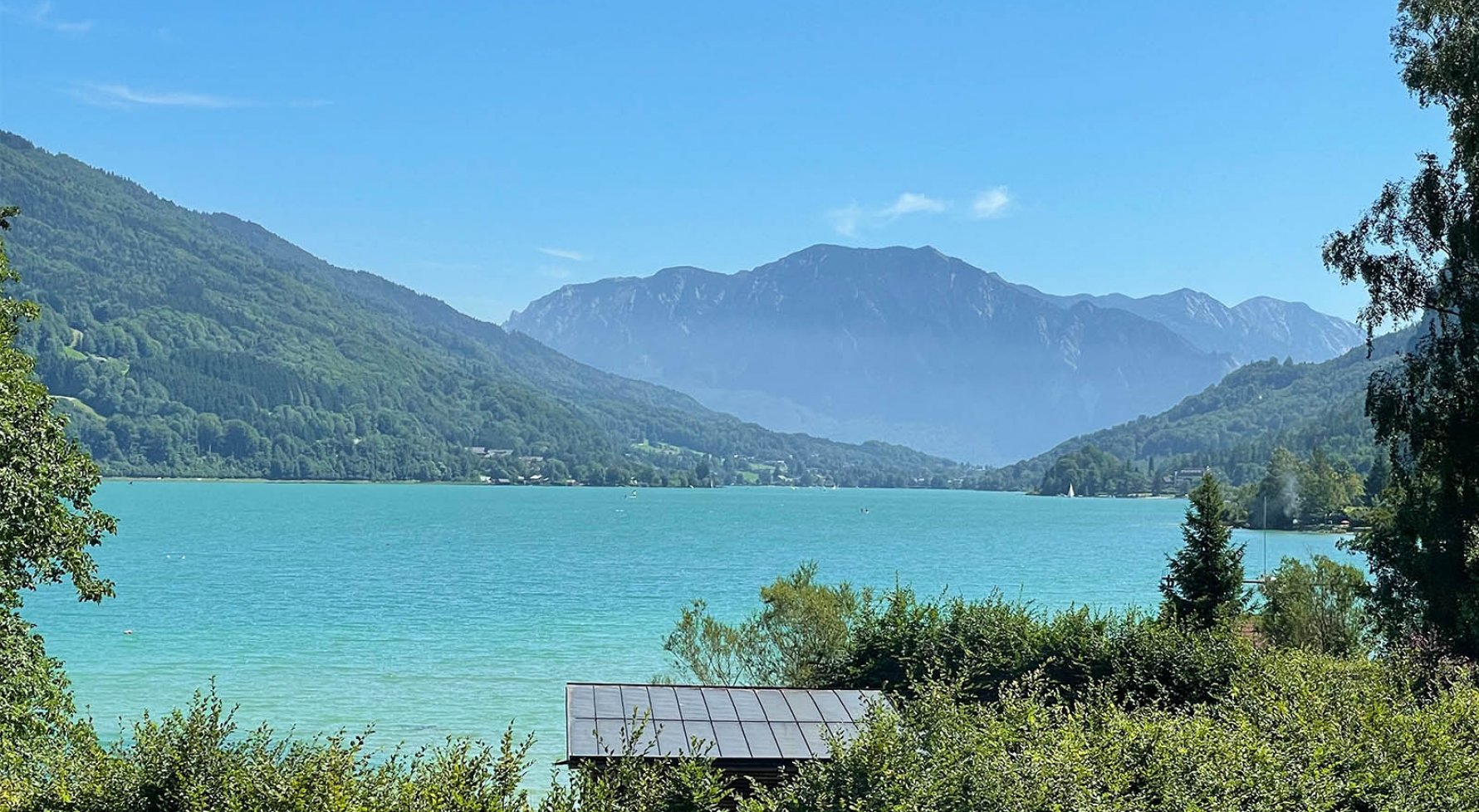 Immobilie in 5310 Sankt Lorenz am Mondsee: Platz an der Sonne am Mondsee! Neubau Eck-Haus mit privatem Badeplatz - bild 1