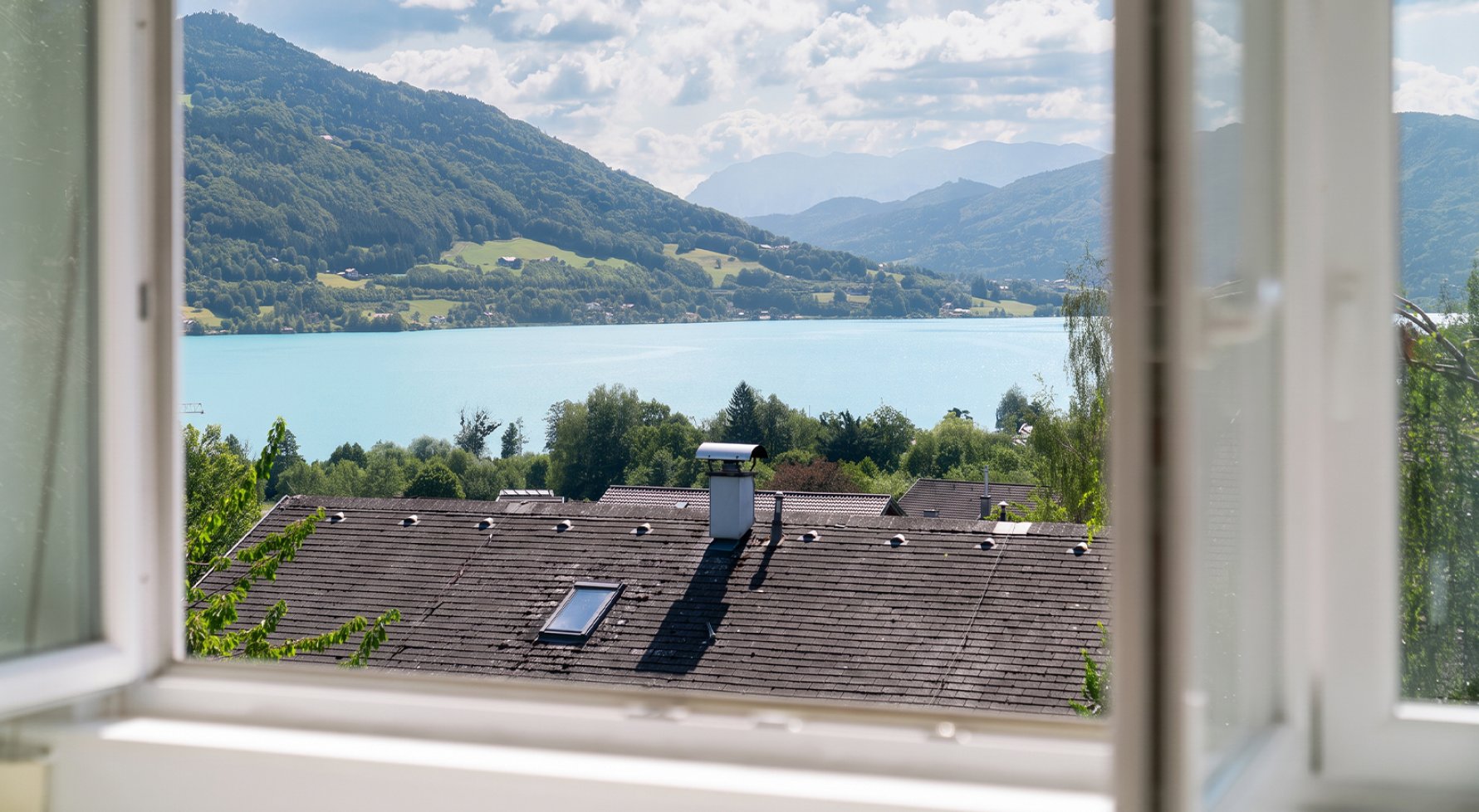 Immobilie in 5310 Salzkammergut - Mondsee: Ein Zuhause mit Aussicht! Maisonettewohnung mit traumhaftem Mondseeblick - bild 1
