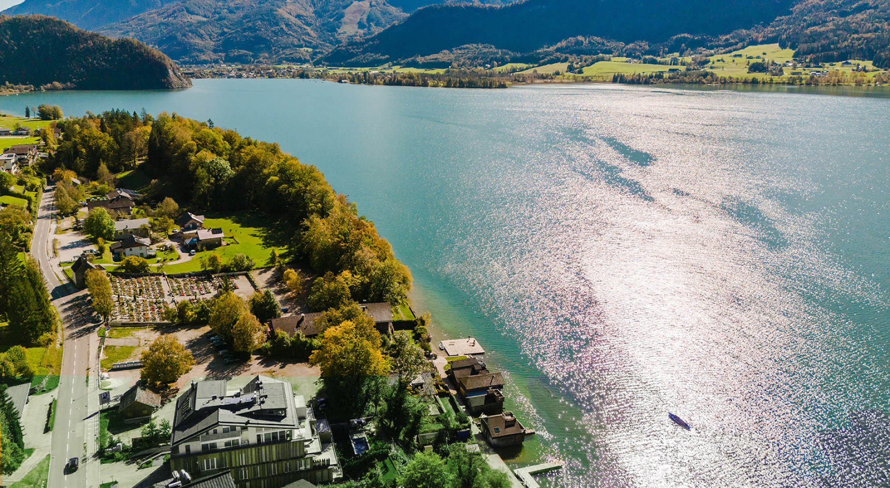 Nemovitosti v 5360 Salzkammergut - Wolfgangsee: MÍSTO V PRVNÍ ŘADĚ U JEZERA! Byt s vlastním molem u jezera Wolfgangsee - obrázek 1
