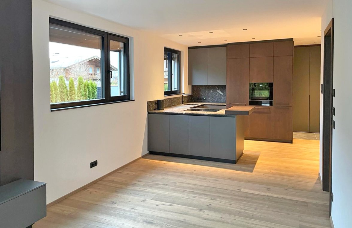 Immobilie in 6380 Tirol - Kitzbüheler Alpen - St. Johann in Tirol: Exklusive Garten-Villenetage mit Pool und Hornblick! - bild 3