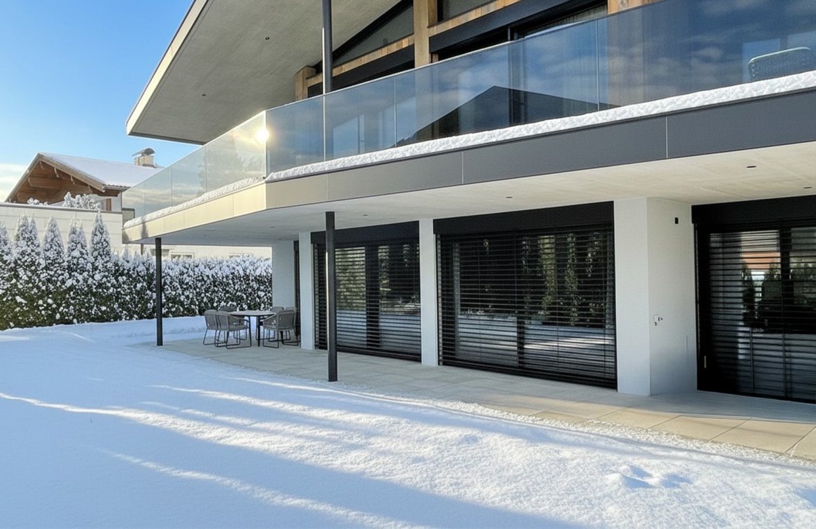 Immobilie in 6380 Tirol - Kitzbüheler Alpen - St. Johann in Tirol: Exklusive Garten-Villenetage mit Pool und Hornblick! - bild 1