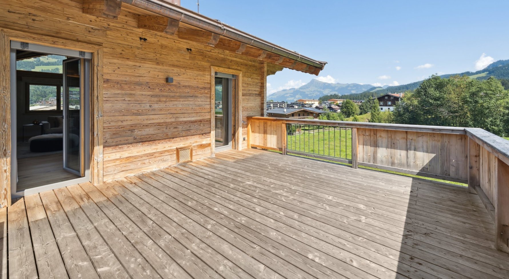 Nemovitosti v 6365 Tirol - Kitzbüheler Alpen - Kirchberg in Tirol: Ústup s vysoce kvalitním šikem! Mezonetový byt v Kitzbühelských Alpách - obrázek 1